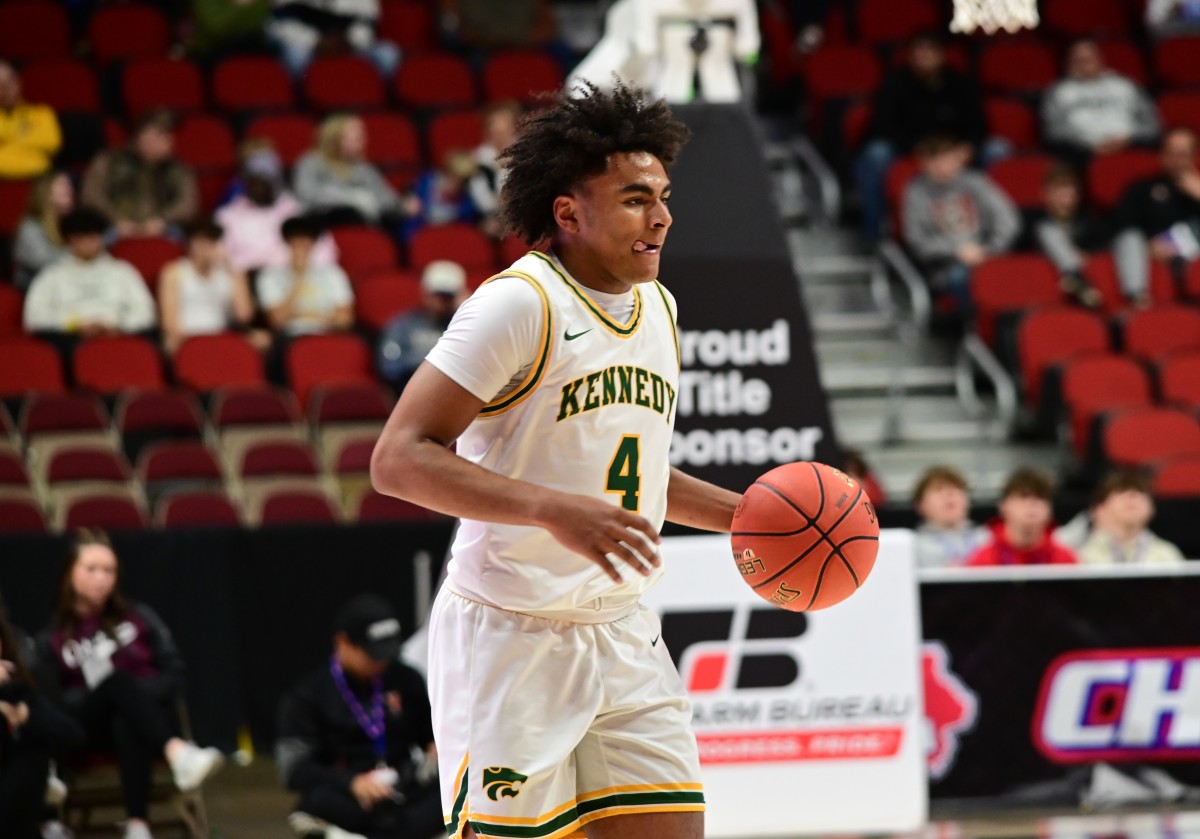 CR Kennedy's Cyrus Courtney dribbles up the court against Valley during the Class 4A state championship game at Wells Fargo Arena in Des Moines on Friday. (Photo by Ryan Timmerman)